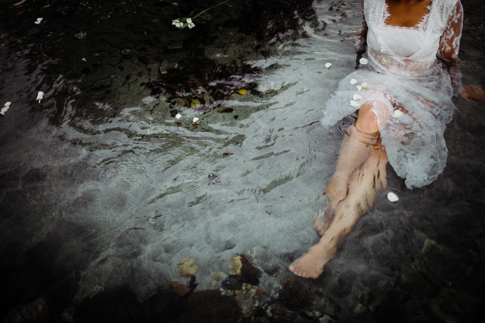 Forest falls bride in river