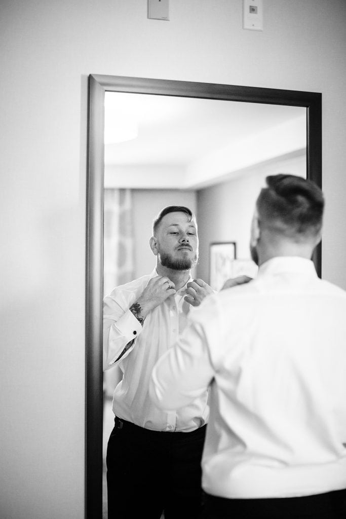 groom getting ready wedding at the villa Orange County