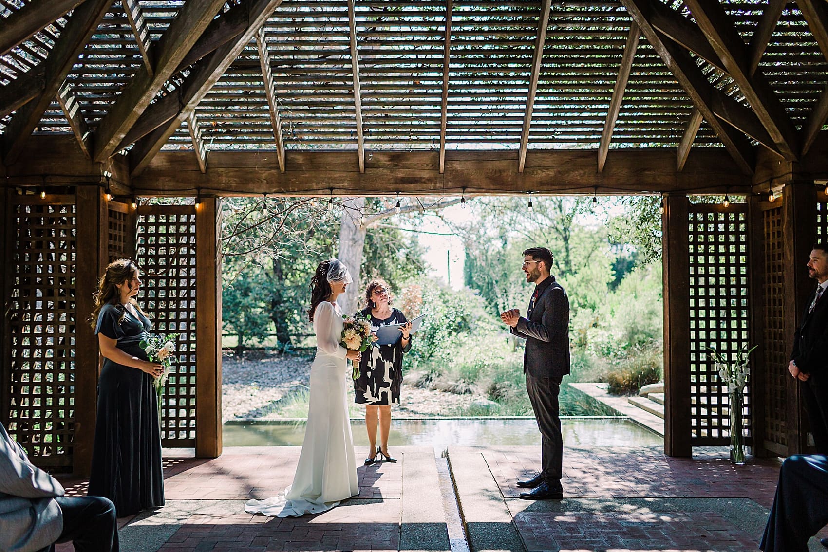 Groom's vows in botanical garden wedding in Claremont