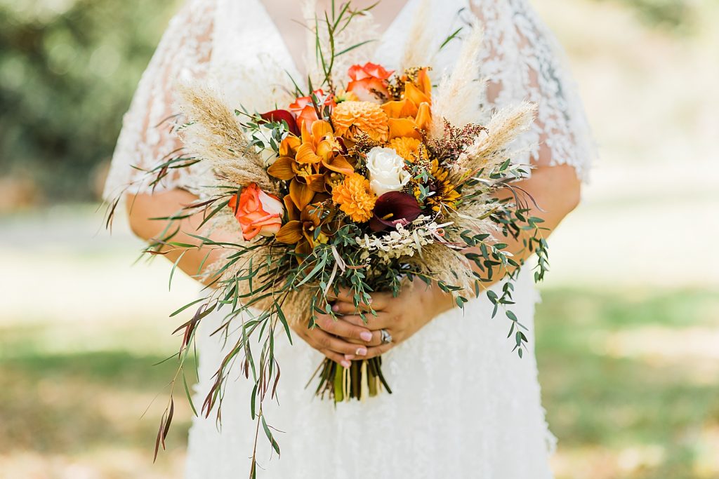 wedding bouquet bride hidden acres fall wedding Lyle creek