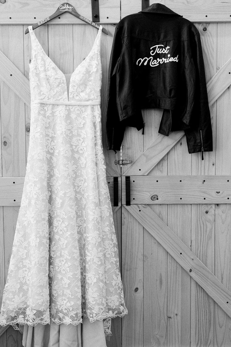 Wedding dress and just married leather jacket at Millers Landing Lake Arrowhead