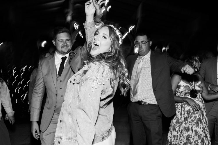 bride dancing at hidden oaks retreat wedding in Rancho Cucamonga