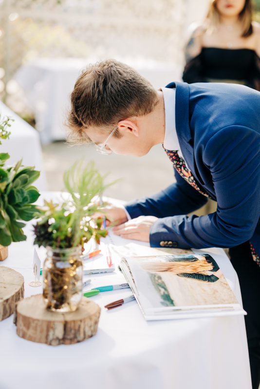 guests signing guestbook