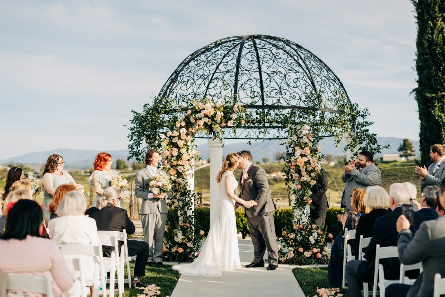 Avensole winery spring wedding first kiss