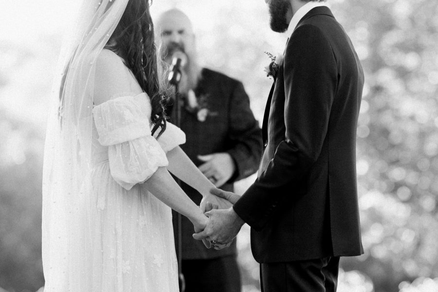 bride and groom at alter