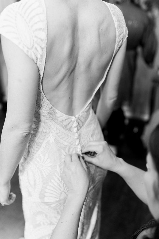 Non-binary bride getting ready