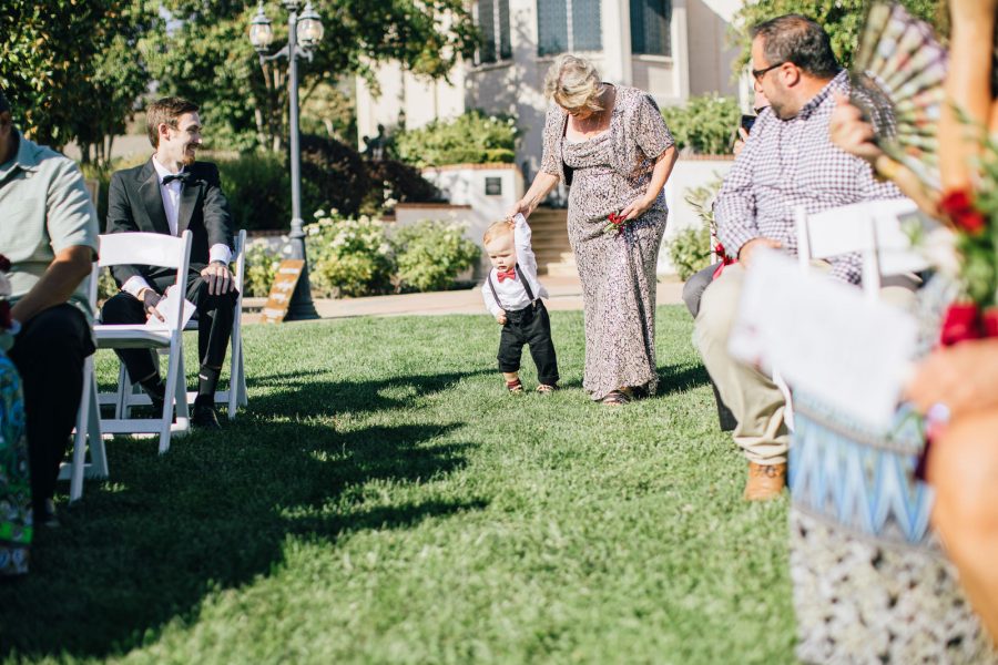 son walking up the aisle