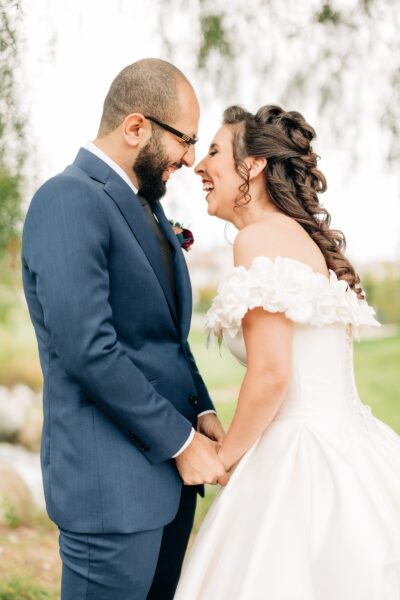 Black and gold spring wedding first look