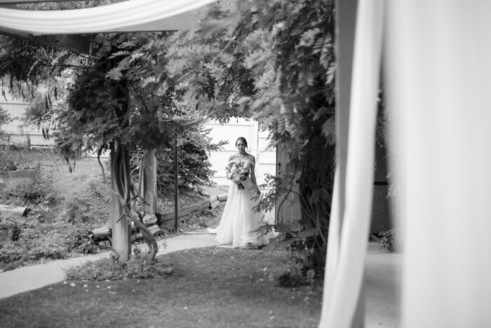 Bride walking up aisle at Miller's Landing
