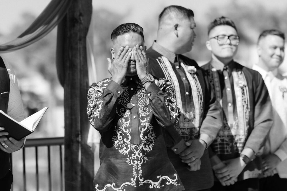 groom seeing bride at the pond at Casey orchard wedding